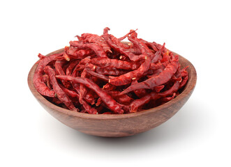 Dried red hot pepper pods in wooden bowl