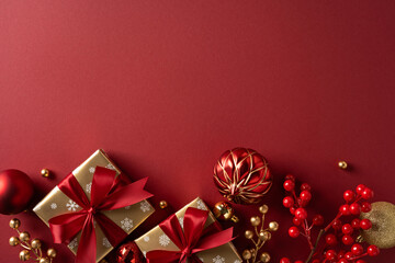 Luxurious red and gold gift setup with ribbons, ornaments, and berries on a rich backdrop,...