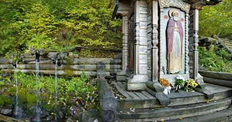 Moscow oblast. Russia.  September 27, 2023. Fragments of the decoration of wooden buildings of the fonts of the architectural complex of the holy spring Gremyachy Klyuch.