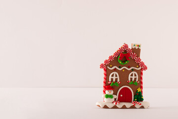 Gingerbread house isolated on a white background. Christmas holiday concept.