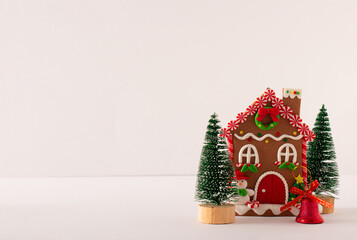 Gingerbread house with decoration isolated on a white background. Christmas holiday concept. Copy Space.