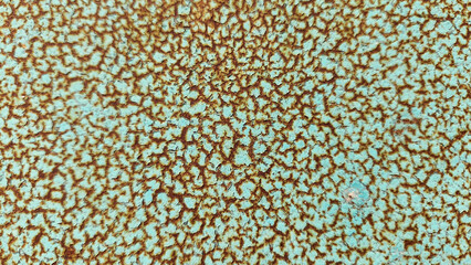 Texture formed by rust on green-painted metal as a background.