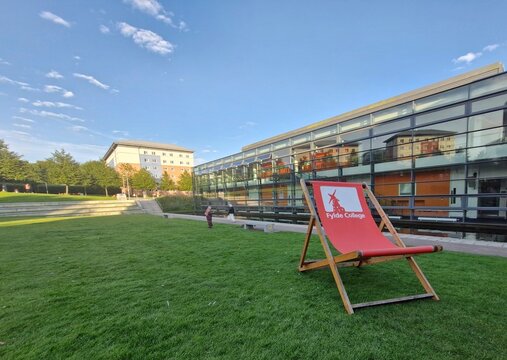 LANCASTER, LANCASHIRE, ENGLAND - JULY 17, 2025:Large decking chair of Fylde College at Lancaster University (LU) Convocation Day. Fylde College is one of the eight colleges under LU collegiate system.