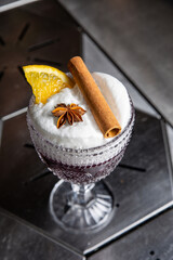 A delicious alcoholic cocktail at the bar. The bartender prepares cocktails