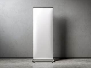 White rollup banner stand in front of a textured concrete wall and floor in a studio setting