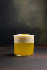 A delicious alcoholic cocktail at the bar. The bartender prepares cocktails