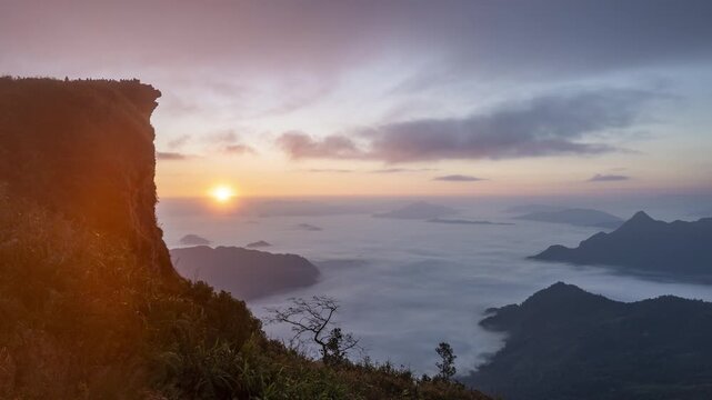 Epic Sunrise View from Phu Chi Fa Cliff over Sea of Mist, Northern Thailand Scenic Landscape