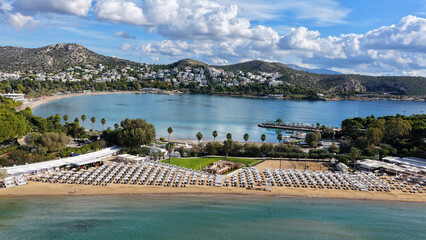 Aerial drone photo of amazing organized sandy celebrity beach of Asteras featuring Temple of Apollo...