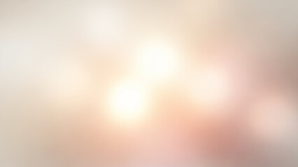 Softly blended abstract background featuring warm golden and peach hues with subtle light streaks