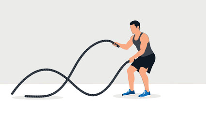 Athlete engaged in intense battle rope workout with minimalist background