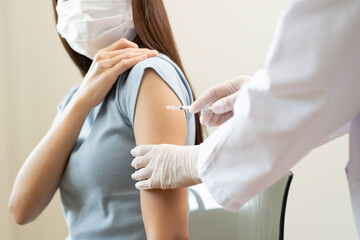 Health care, corona virus, hand of woman nurse, doctor giving syringe vaccine, injection dose on...