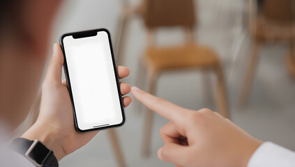 Close up of person holding a smartphone with a blank white screen and touching it