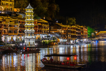 Fenghuang, Hunan, China. 11-02-2024. View of Fenghuang city at night with illuminations. Hunan,...