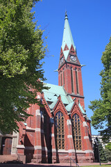 Kotka Church which was inaugurated in 1898. The Neo-Gothic church with its towers is an unusual red brick building in the Kotka cityscape, Kymenlaakso province, Finland.