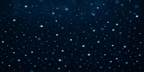 Blue winter night sky with snowflakes falling and a galaxy of starry light