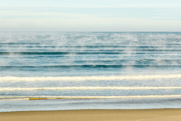 Global warming or warm ocean creating haze.