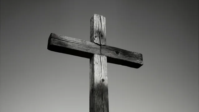 High contrast black and white cross with partial shadow