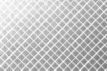 Macro halftone print of a geometric diamond lattice made of striped tiles in diagonal rows on a transparent background, forming a repetitive abstract grid.