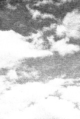Macro halftone print of a soft cloudy sky with bright gaps, diagonal black lines suggesting drifting clouds on a transparent background. © Vjom