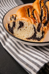 poppy seed roll braided poppy seed brioche sweet pastry dessert poppy seed roll tasty snack fresh gourmet food table setting rustic food top view copy space