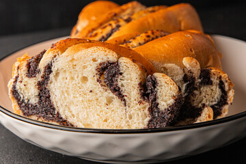 poppy seed roll braided poppy seed brioche sweet pastry dessert poppy seed roll tasty snack fresh gourmet food table setting rustic food top view copy space
