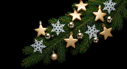 Christmas tree branch with golden stars and white snowflakes ornaments decoration on black background