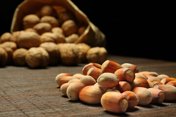 Hazelnuts, filbert on old wooden table.