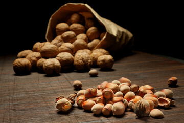 Hazelnuts, filbert on old wooden table.
