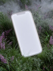 Futuristic smartphone mockup in foggy nature with glowing screen and wildflowers