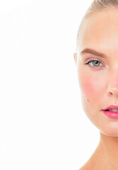 Beautiful face of young adult woman with clean fresh skin. Looking at Camera.