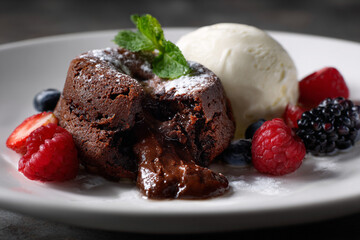 Decadent molten lava cake oozing rich chocolate.