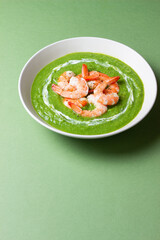 Green broccoli soup with shrimp. Vegetarian food. Healthy eating.