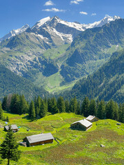 French architecture among the mountain landscape in July 