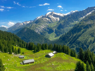 Overlooking mountain huts and the French alpine landscape in July 