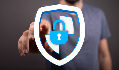 Abstract concept of online security and digital protection shown by person touching a shield and lock icon, representing safety and c