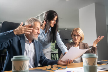 Business meeting with disagreement and tense atmosphere over poor results