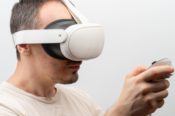 Man uses virtual reality headset side view