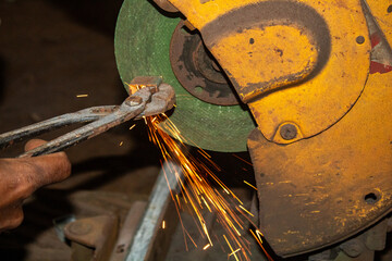 Metal Cutting With Circular Saw Producing Sparks