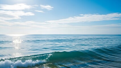 Fototapeta premium Calm Blue Ocean with Gentle Waves Under Bright Sky in Summer