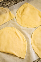 Raw halal tatar chebureks prepared for cooking