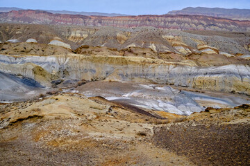 Madygen Geopark Kyrgyzstan Colorful Odd-Even mountains Batken Unique Triassic paleontological site alien landscapes rare fossils.