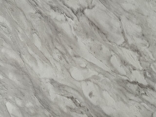 Fototapeta premium Close up of white marble with dark veins. Minerals marble pattern. White grey bianco marble looking. Seamless background texture.