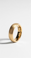 Brushed Gold Wedding Ring on White
