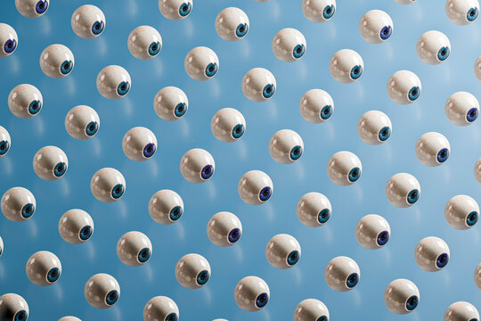 Eyeball grid forming pattern in minimal blue 3D background