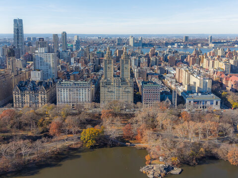 Aerial view of Central Park's muted autumn hues contrasting with the San Remo's towers and Manhattan's majestic skyline, Manhattan, New York, United States.
