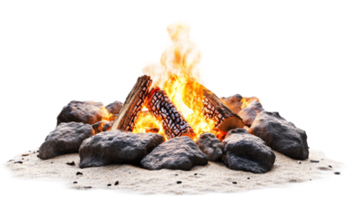 Fiery beach bonfire illuminating the sand and surrounding darkness in a warm glow