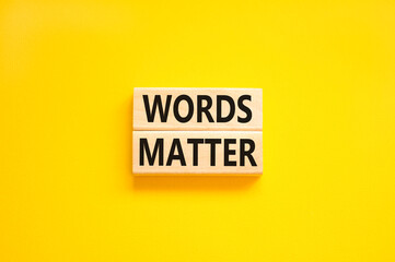 Words matter symbol. Concept word Words matter on beautiful wooden blocks. Beautiful yellow paper background. Business words matter concept. Copy space.