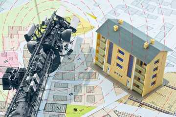 Electromagnetic pollution exposure in a residential area - concept with base radio station for global communications services and electromagnetic emissions fields with cadastral map and building model