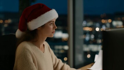 Wide shot of Santa’s minimalist workspace with soft holiday décor and city lights outside window — symbolizing modern entrepreneurship, mindfulness at work, and calm celebration of achievement
