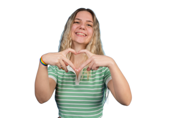 Young woman showing heart hands with pride bracelet
